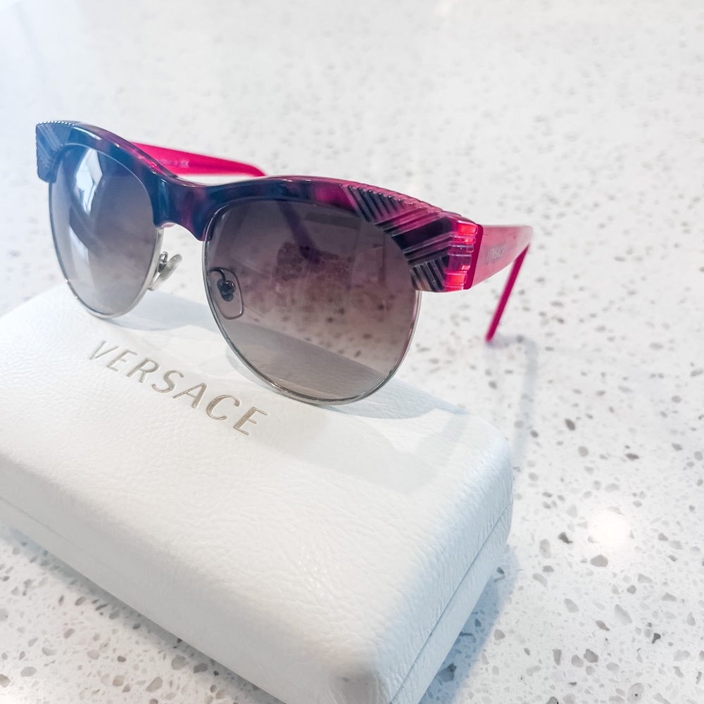 Vintage style red Versace sunglasses, like new condition.